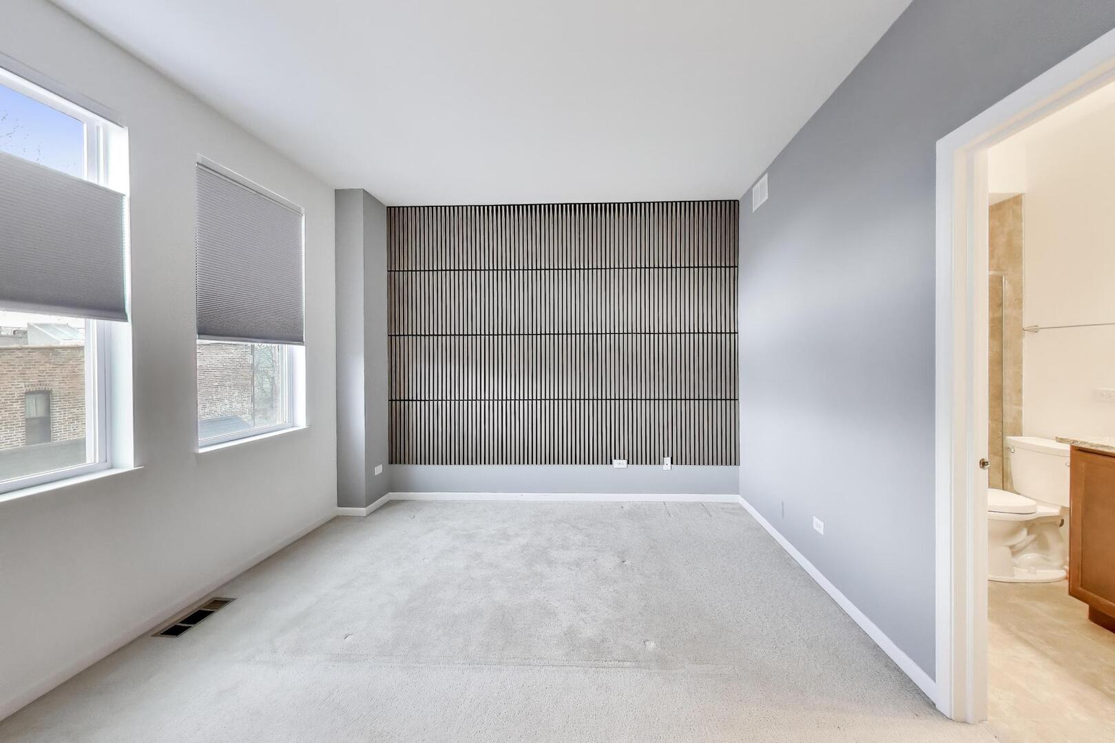 3625 South Morgan Street, Unit C Chicago, IL 60609 - Photo 23 of 44 a view of an empty room with a window