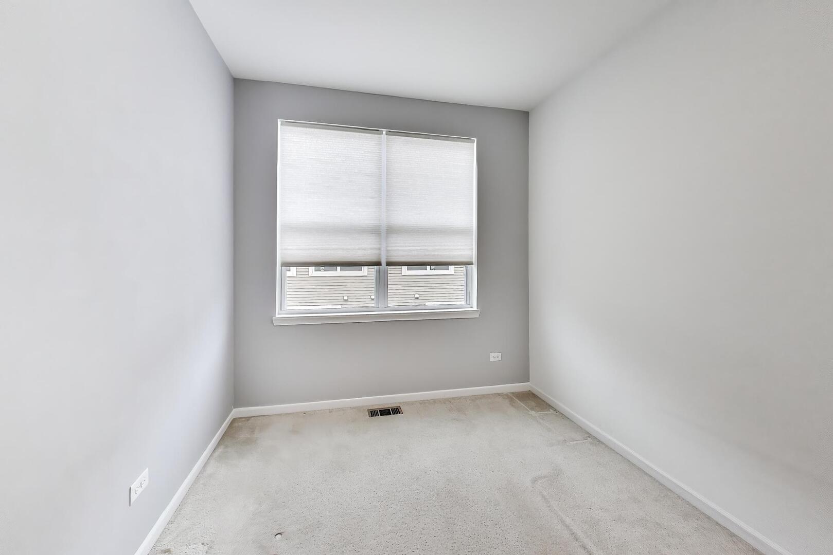 3625 South Morgan Street, Unit C Chicago, IL 60609 - Photo 29 of 44 an empty room with a window