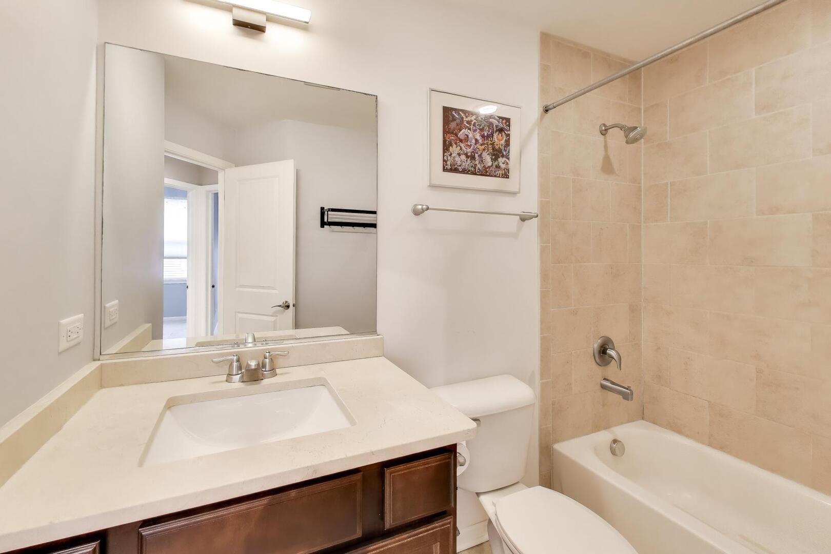 3625 South Morgan Street, Unit C Chicago, IL 60609 - Photo 31 of 44 a bathroom with a sink toilet vanity and shower