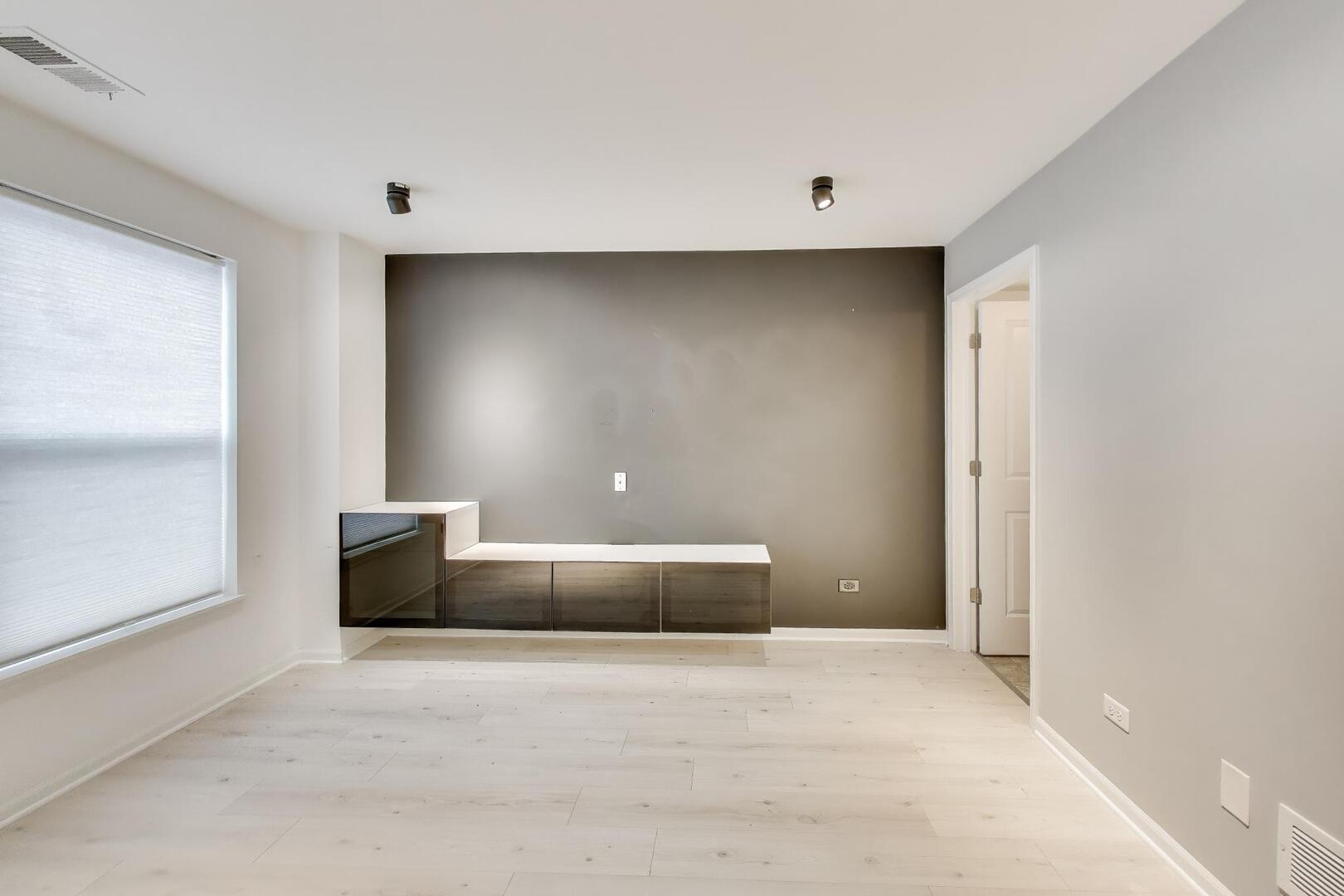 3625 South Morgan Street, Unit C Chicago, IL 60609 - Photo 7 of 44 a view of empty room with cabinet