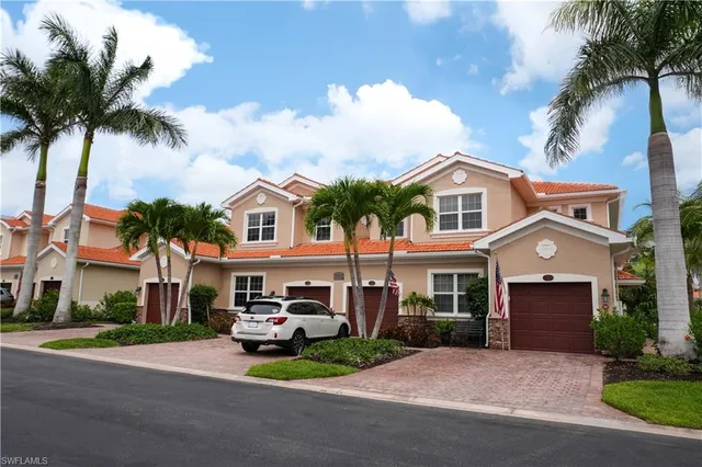 front view of a house with a garden