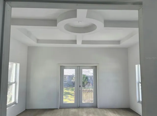 a view of an empty room with a window