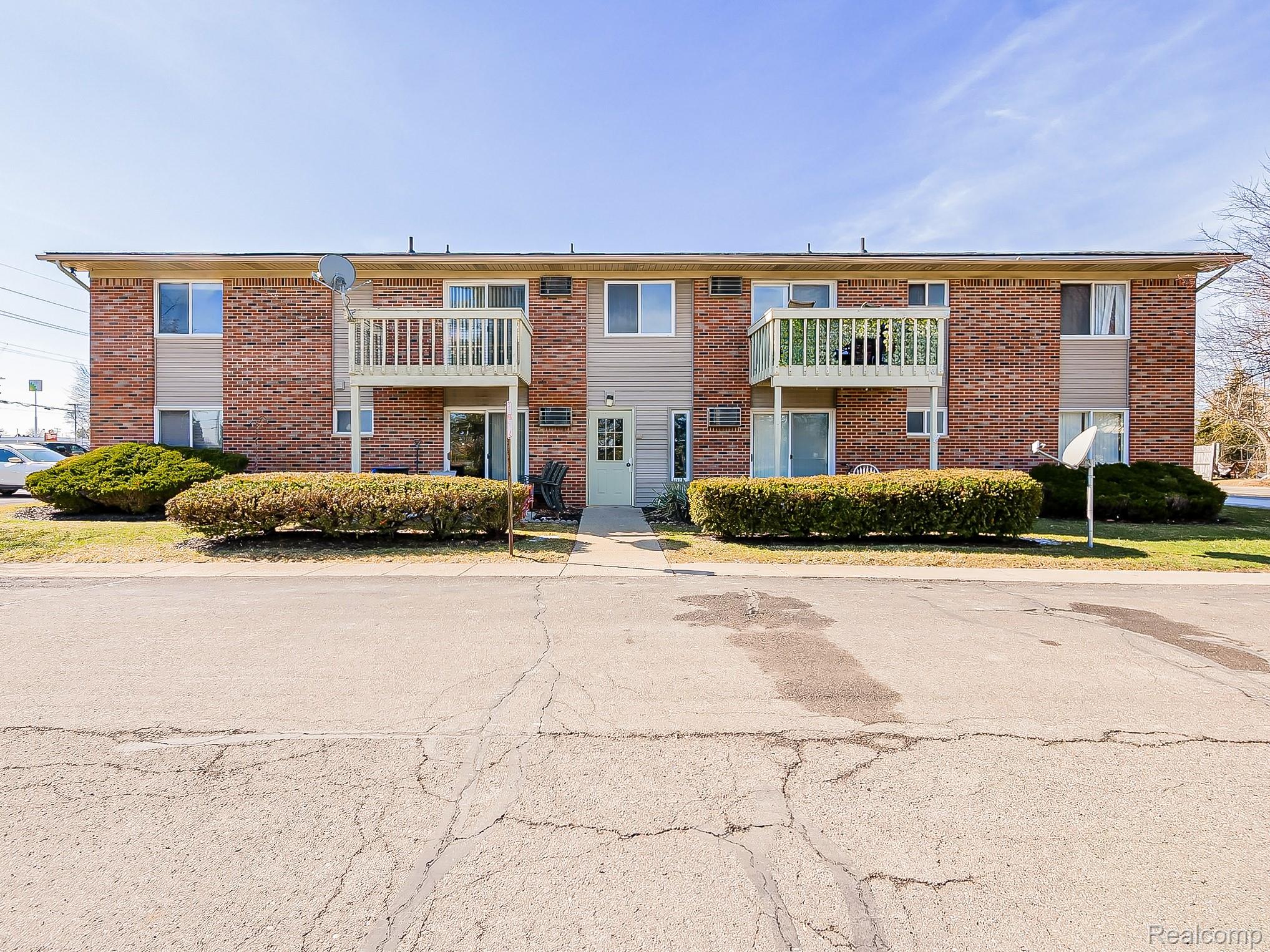 125 East Van Riper Road, Unit 7 Fowlerville, MI 48836 - Photo 25 of 26 View of apartment building / complex