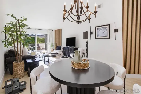 a view of a dining room with furniture window and outside view