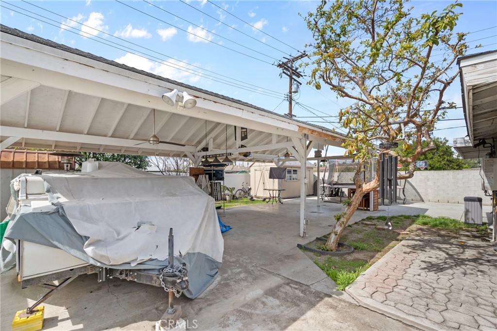 609 La Seda Road La Puente, CA 91744 - Photo 25 of 34 a view of a patio with table and chairs with wooden fence