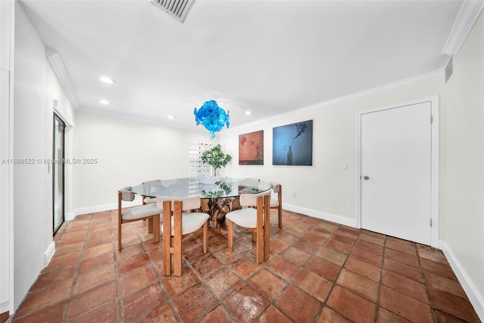 11006 Southwest 138th Place Miami, FL 33186 - Photo 19 of 47 a dining room with furniture and a rug
