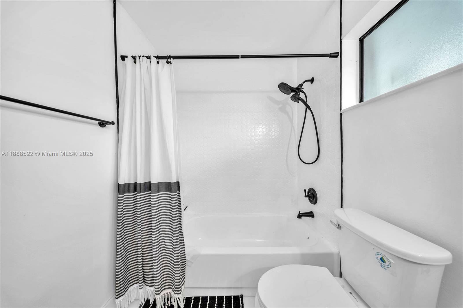 11006 Southwest 138th Place Miami, FL 33186 - Photo 40 of 47 a bathroom with a toilet and a shower