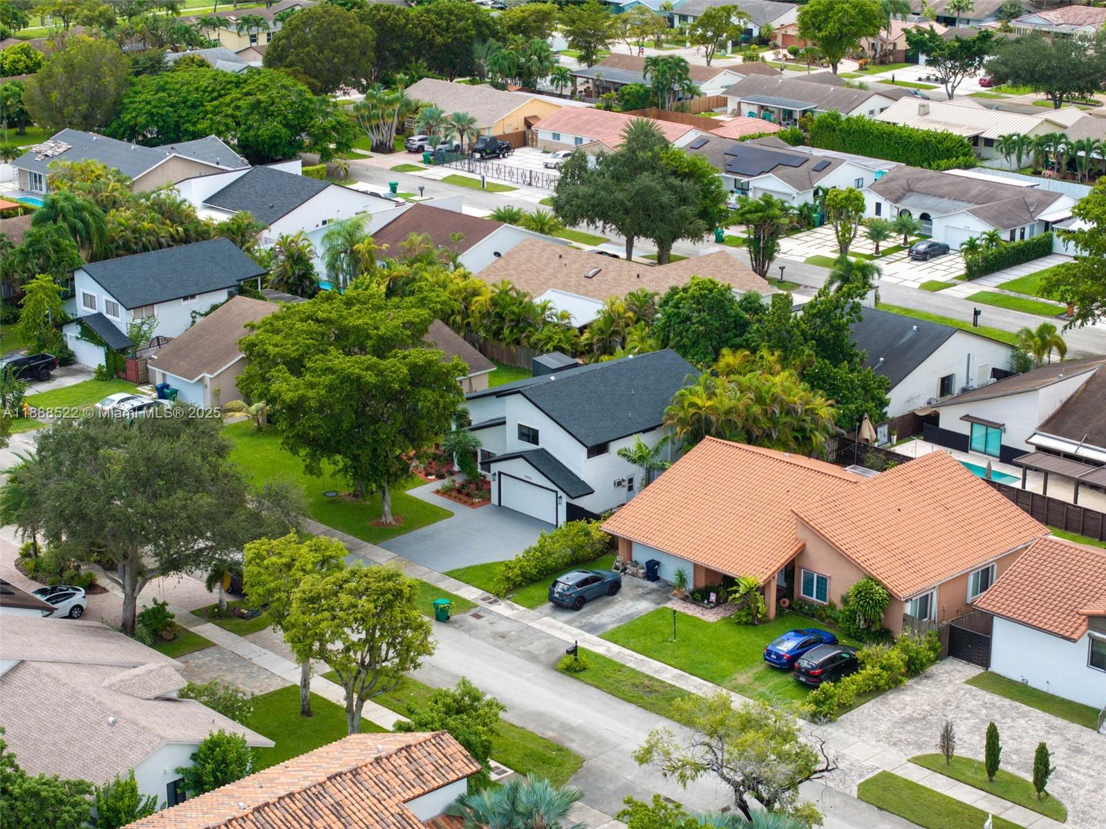 11006 Southwest 138th Place Miami, FL 33186 - Photo 45 of 47 an aerial view of residential houses with outdoor space and street view