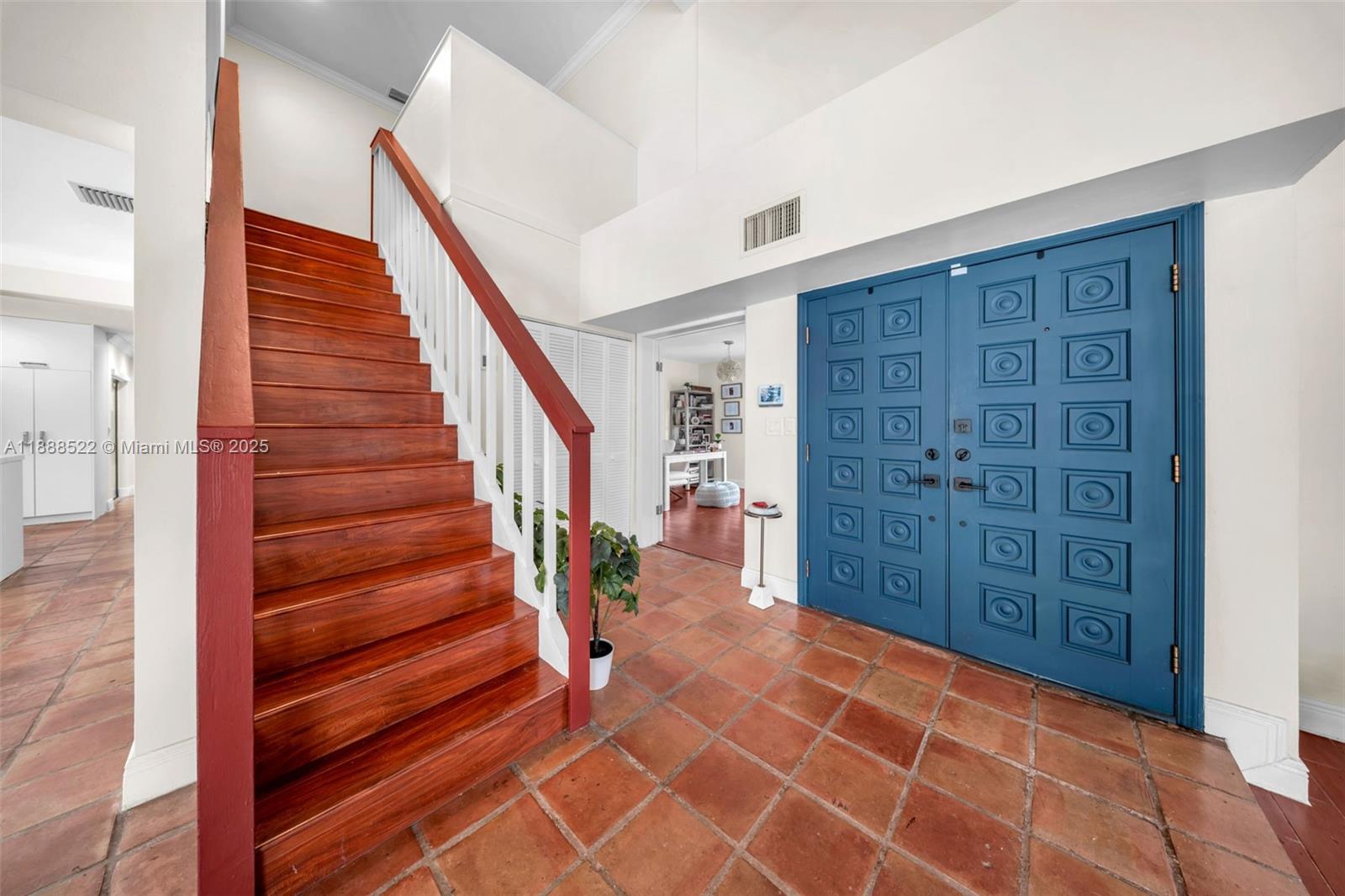11006 Southwest 138th Place Miami, FL 33186 - Photo 9 of 47 a view of an entryway with staircase