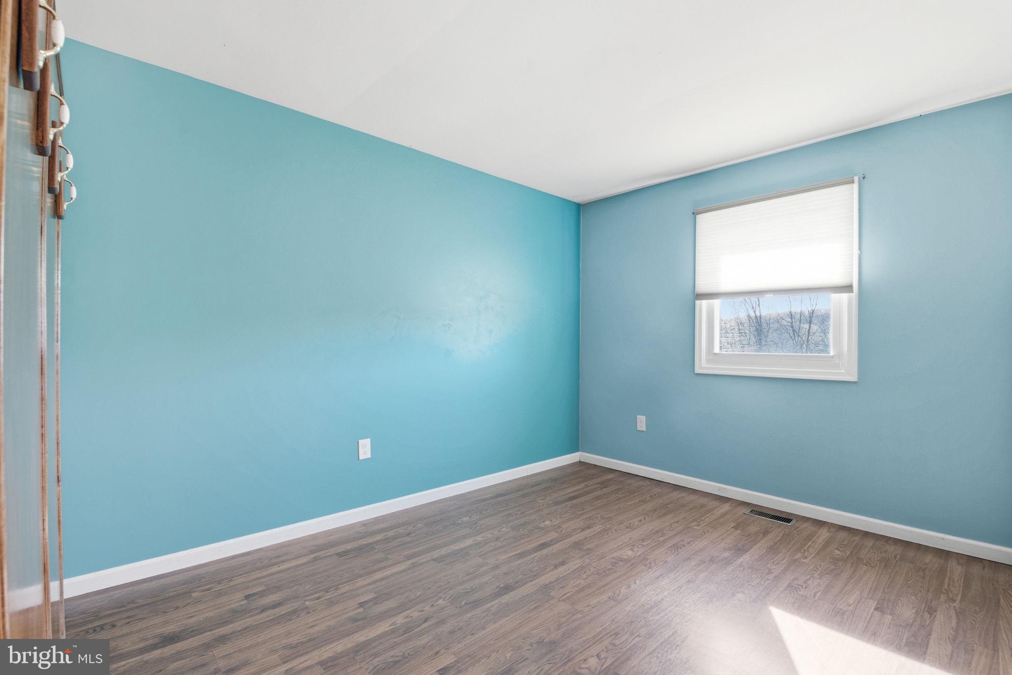 6501 Fair School Road Glen Rock, PA 17327 - Photo 15 of 43 a view of a room with wooden floor and entryway