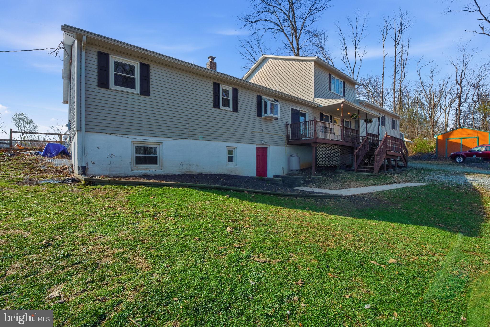 6501 Fair School Road Glen Rock, PA 17327 - Photo 2 of 43 a front view of a house with garden