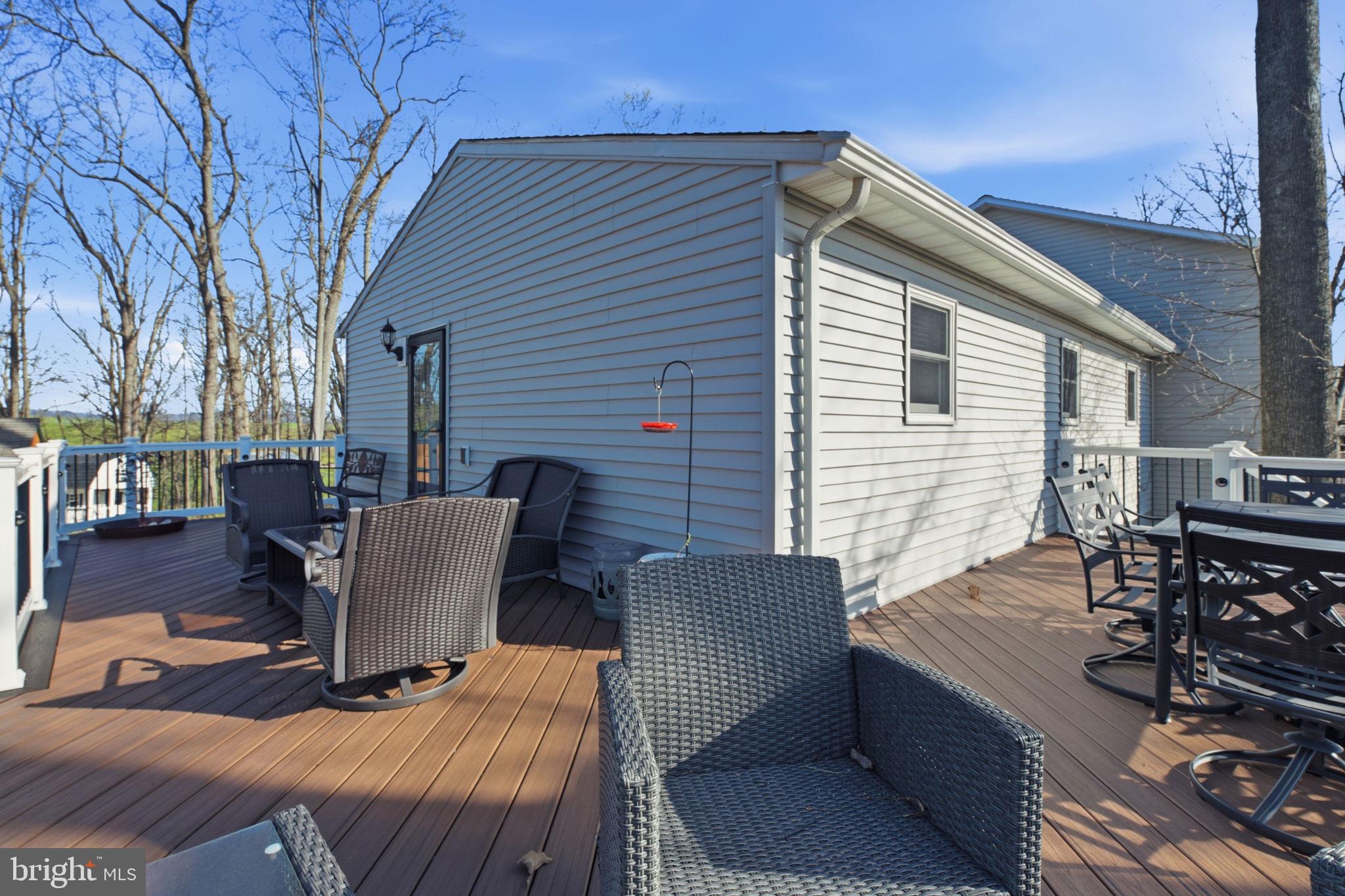 6501 Fair School Road Glen Rock, PA 17327 - Photo 29 of 43 a view of a patio with a table and chairs