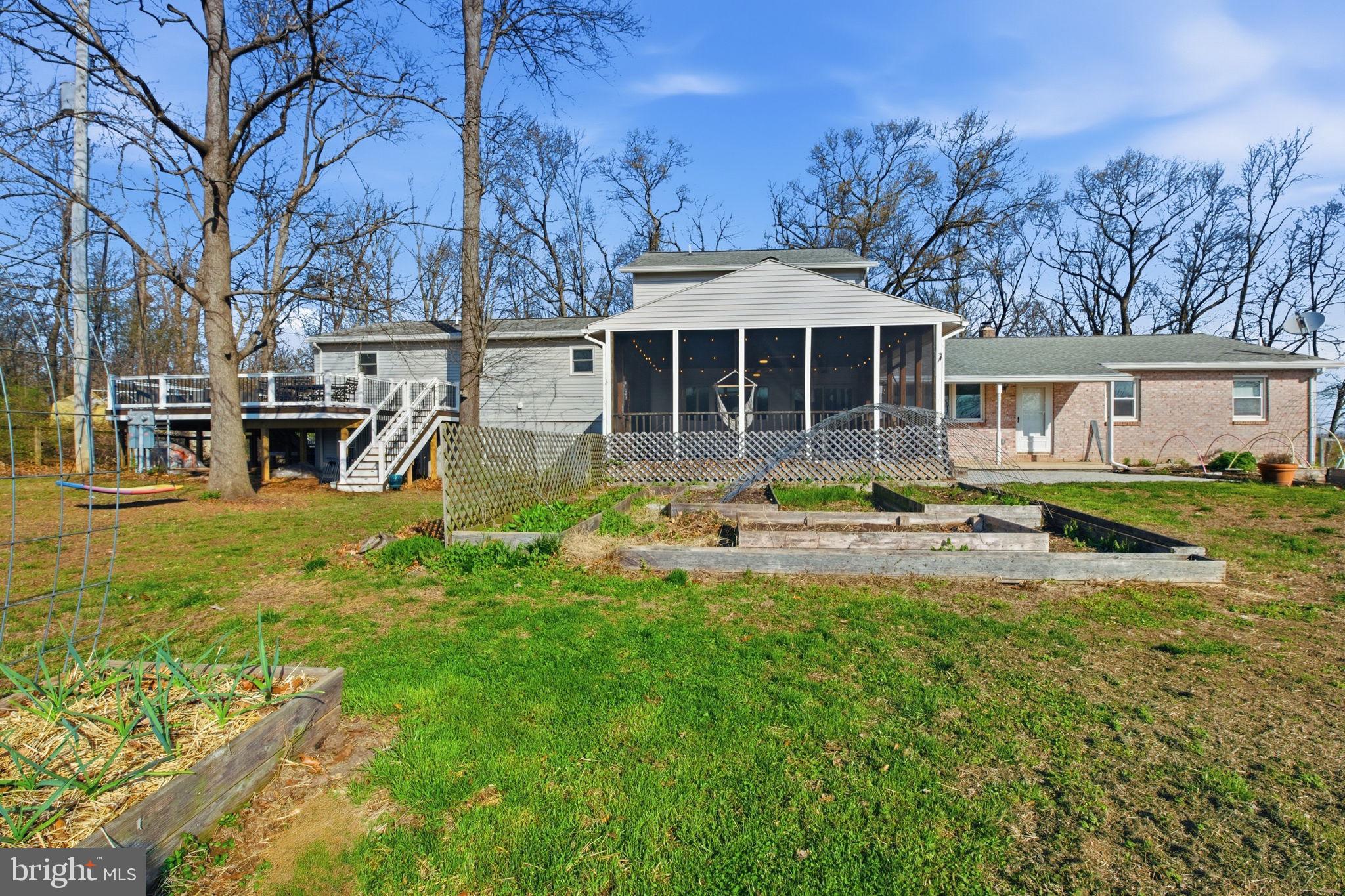 6501 Fair School Road Glen Rock, PA 17327 - Photo 39 of 43 a front view of a house with swimming pool and garden