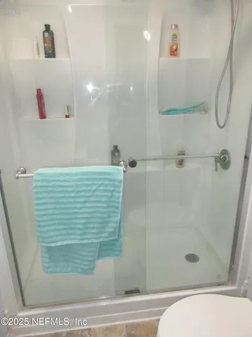 a view of a lake with a yard