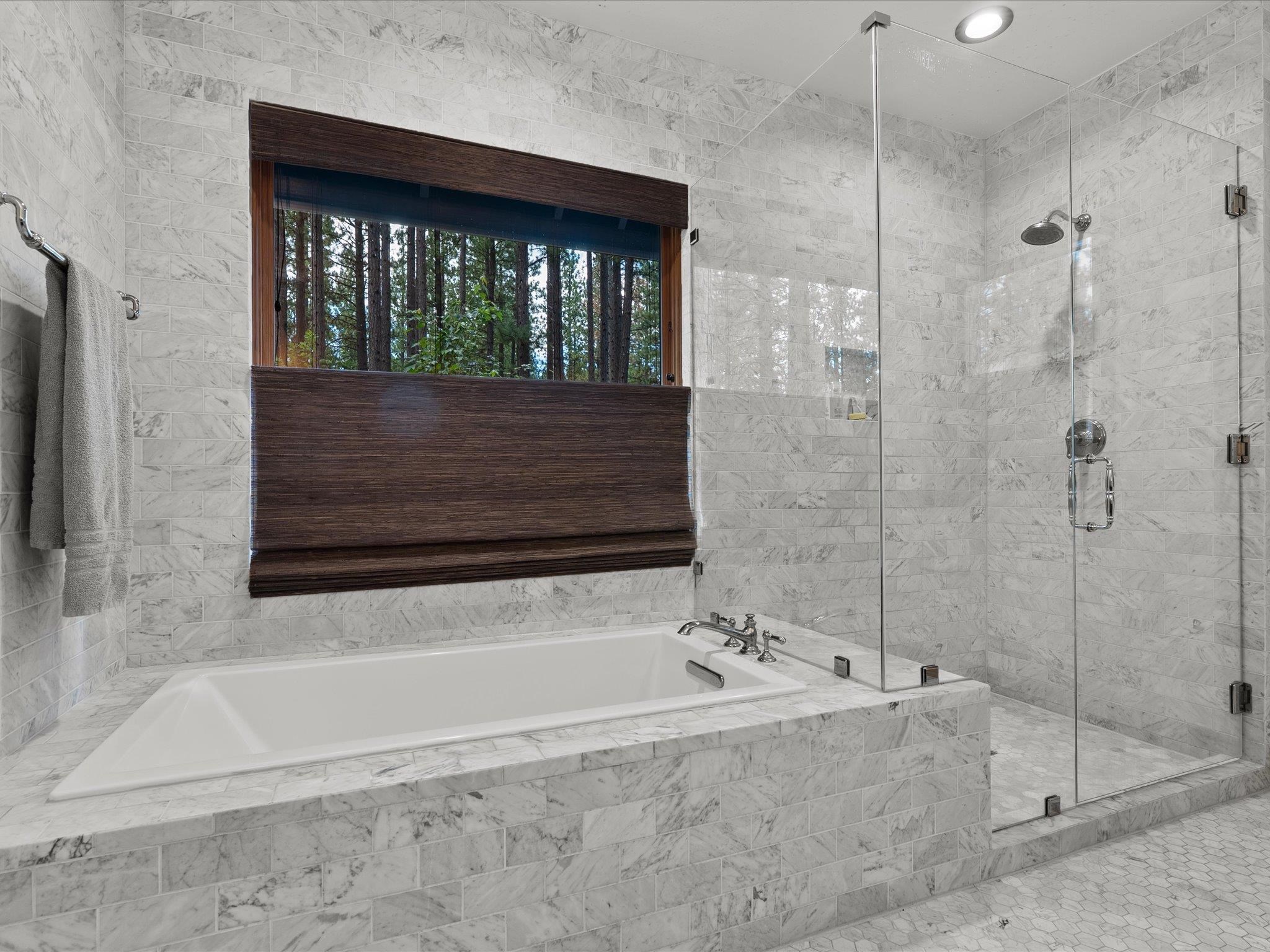 355 Quail View Circle Clio, CA 96106 - Photo 33 of 48 a bathroom with a bathtub and shower