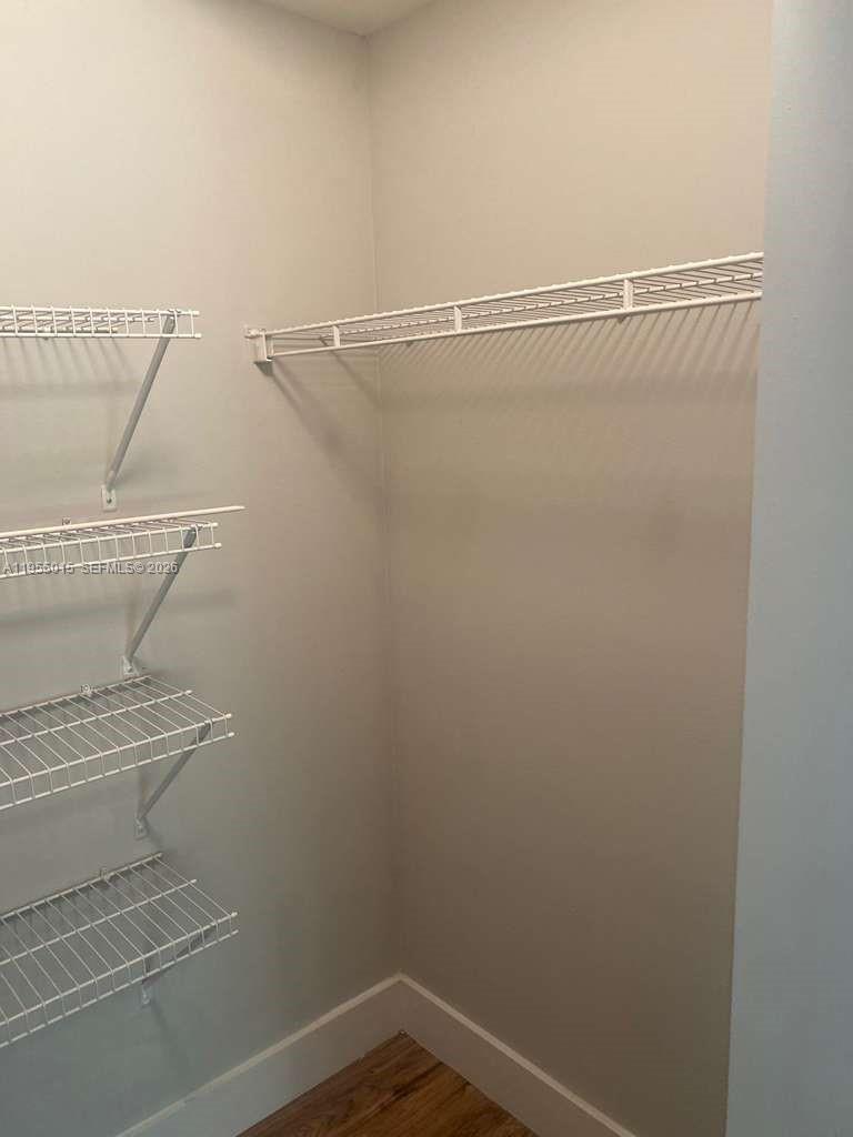 7930 North Nob Hill Road, Unit 304 Tamarac, FL 33321 - Photo 24 of 30 a view of a room with racks on the wall