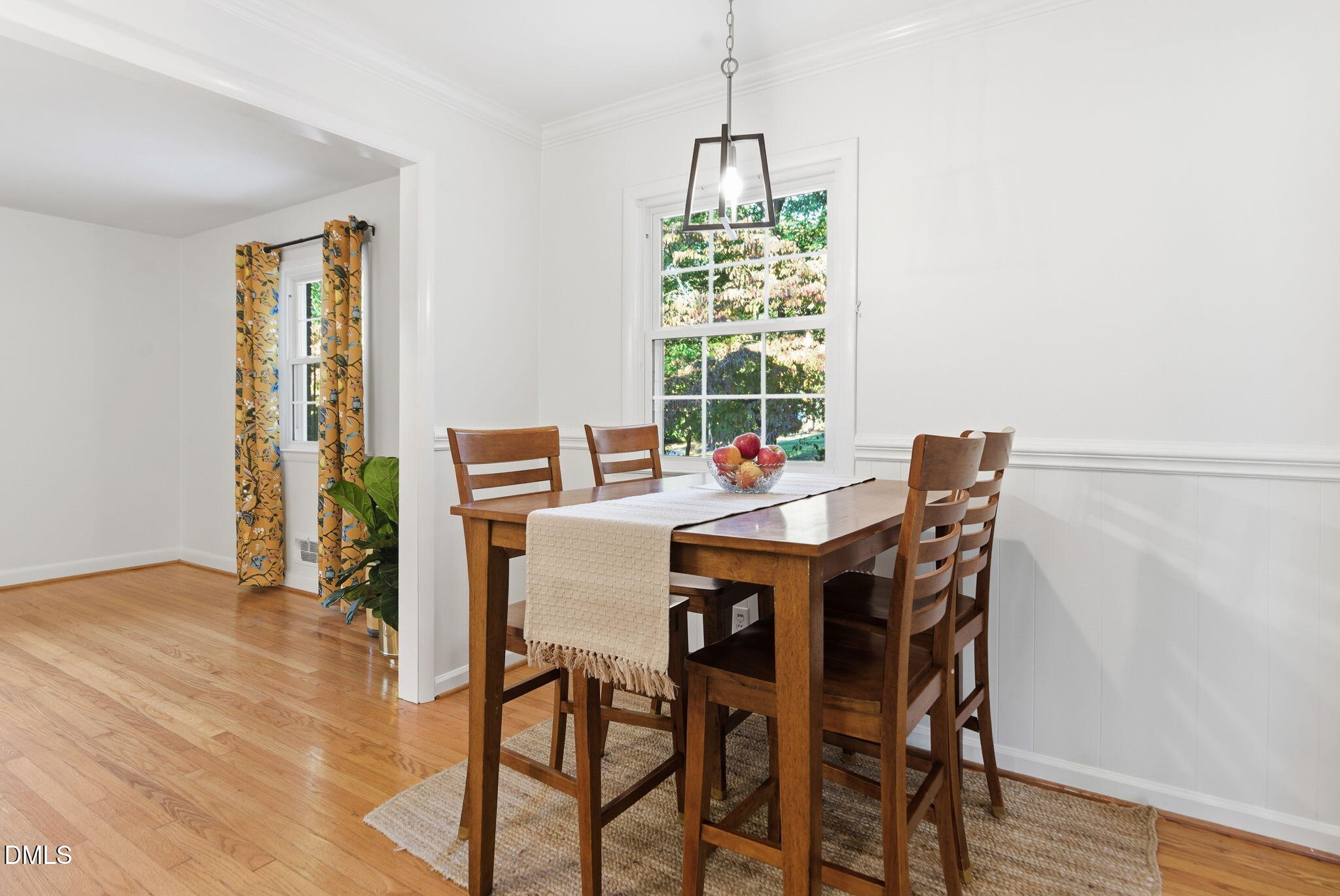 531 West Cornwall Road Cary, NC 27511 - Photo 22 of 77 a view of a dining room with furniture window and wooden floor