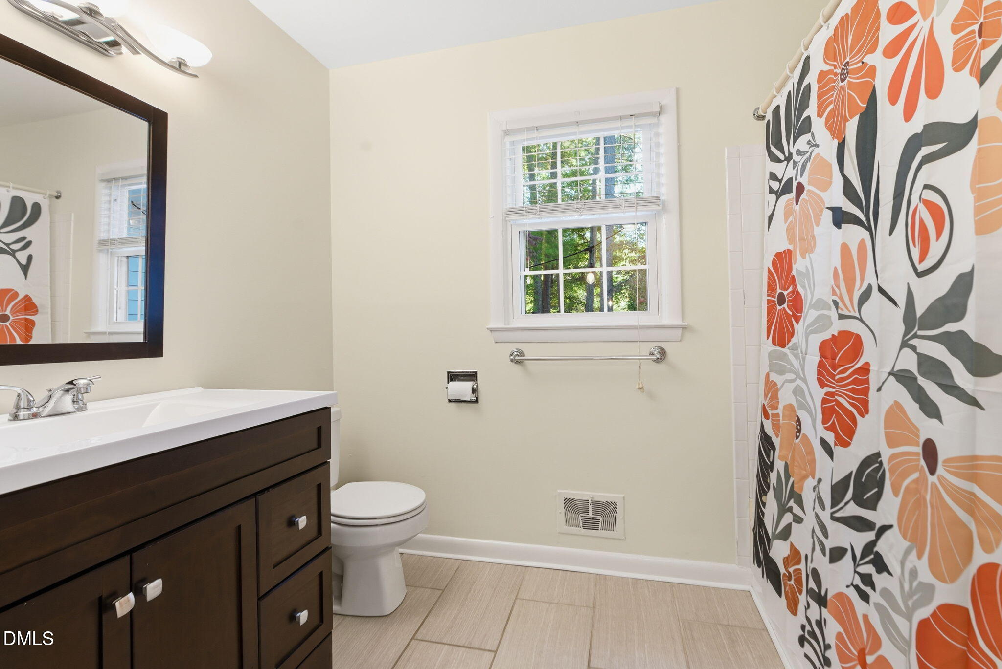 531 West Cornwall Road Cary, NC 27511 - Photo 33 of 77 a bathroom with a granite countertop sink toilet and shower