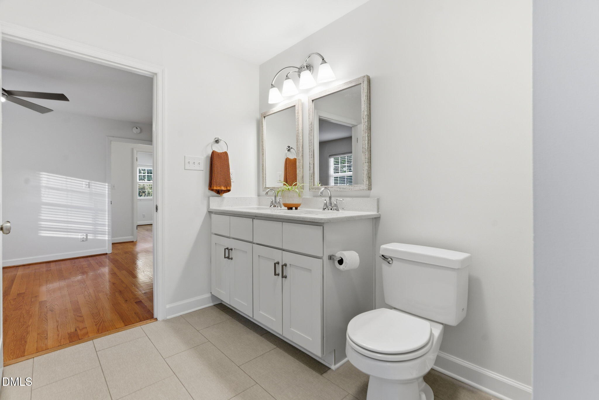 531 West Cornwall Road Cary, NC 27511 - Photo 40 of 77 a spacious bathroom with a toilet sink and mirror