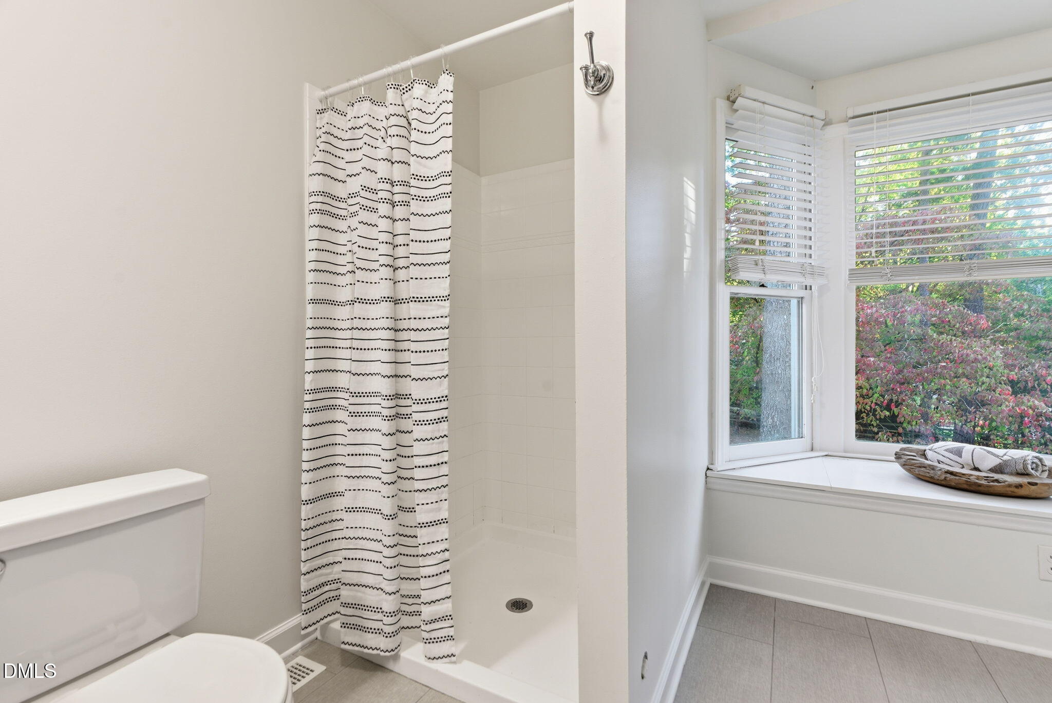 531 West Cornwall Road Cary, NC 27511 - Photo 41 of 77 a bathroom with a toilet and a shower