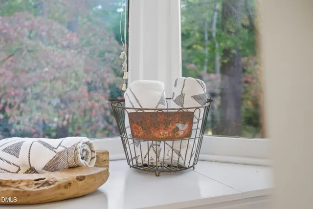 a view of a backyard with sitting area