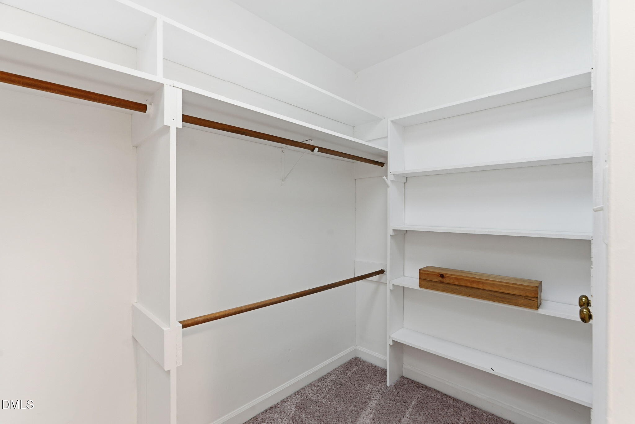 531 West Cornwall Road Cary, NC 27511 - Photo 44 of 77 a view of walk in closet with empty racks