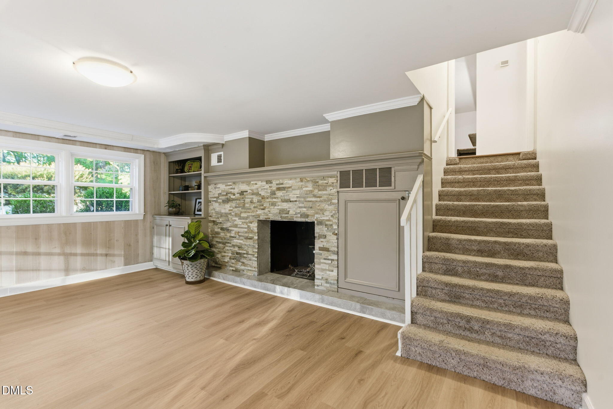 531 West Cornwall Road Cary, NC 27511 - Photo 46 of 77 a view of an empty room with wooden floor and a window