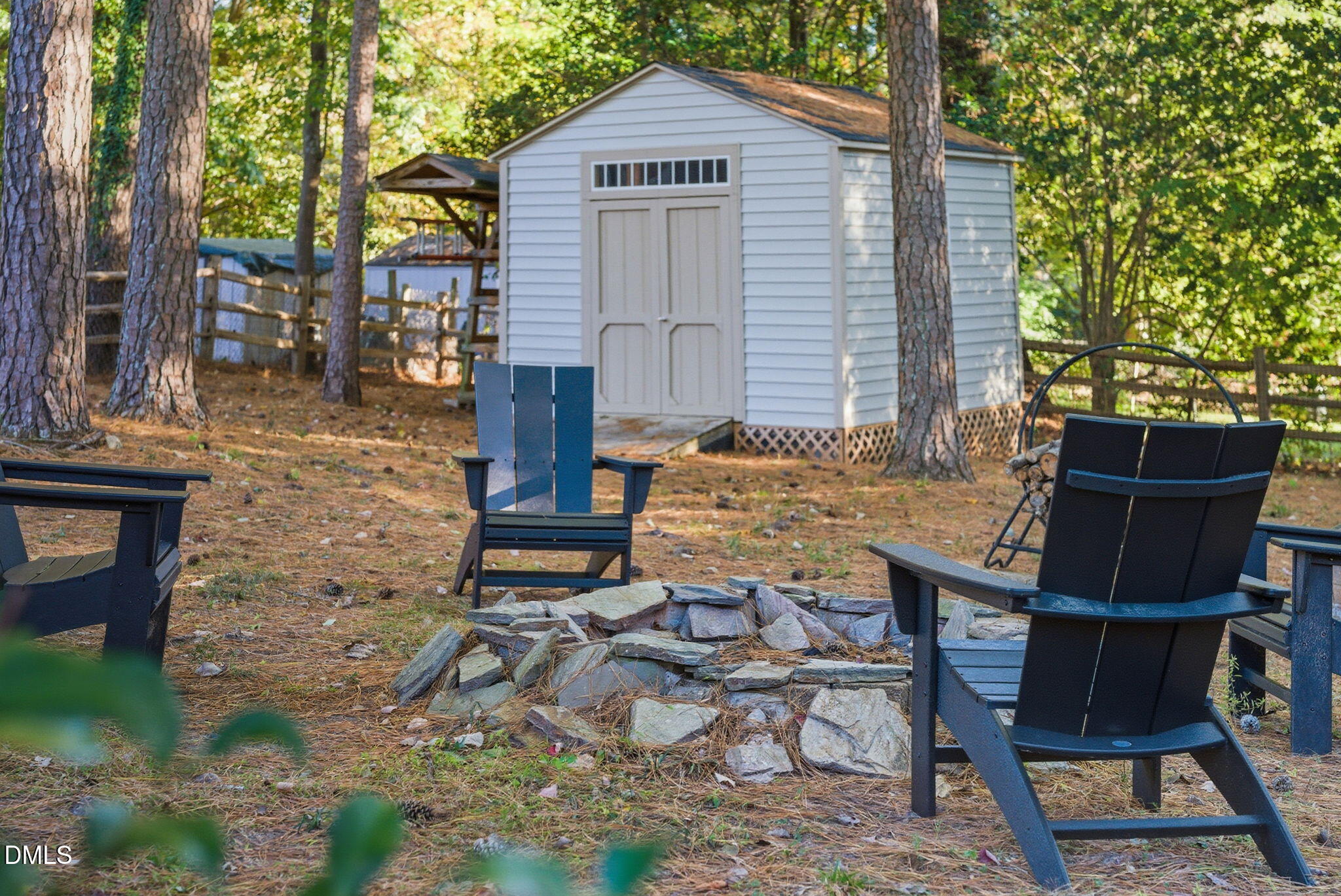 531 West Cornwall Road Cary, NC 27511 - Photo 62 of 77 a backyard of a house with table and chairs