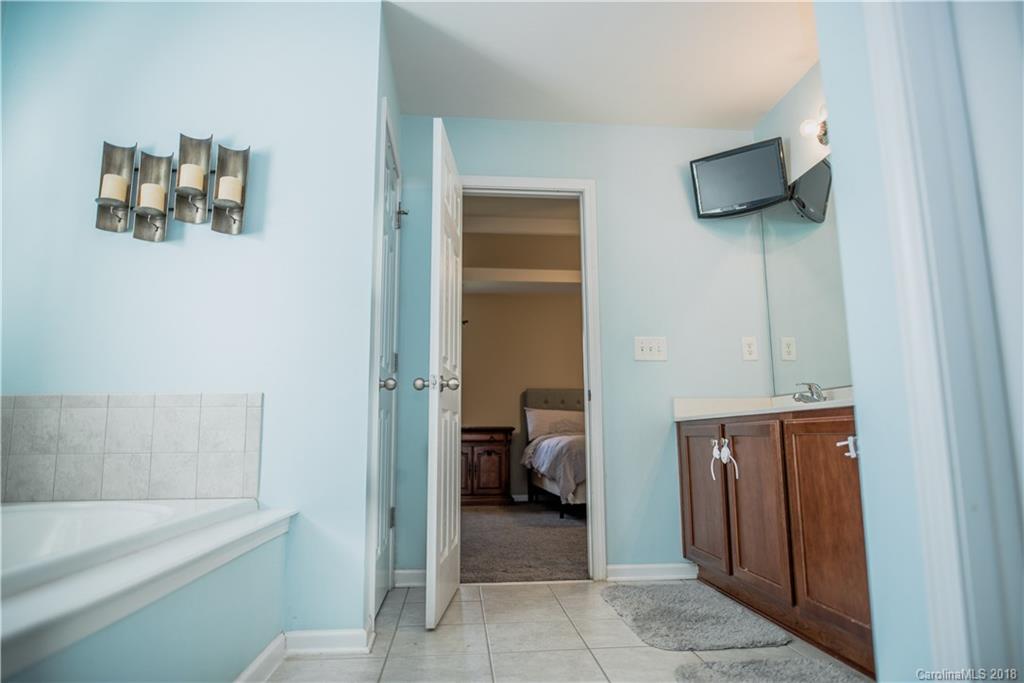 1735 Newland Road Denver, NC 28037 - Photo 14 of 24 a view of hallway with bathroom