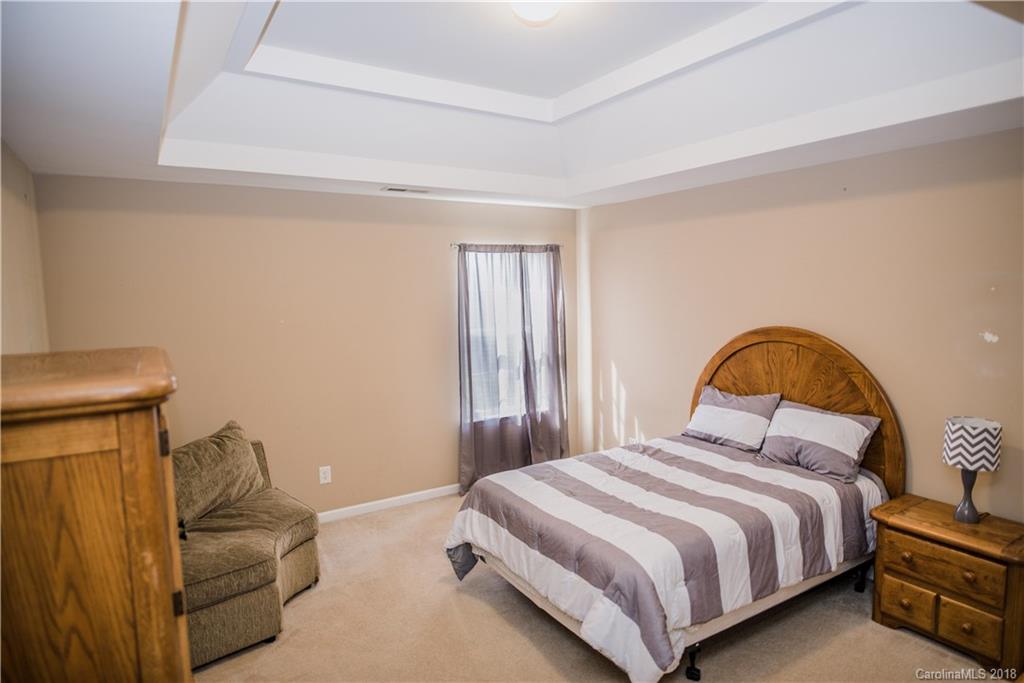 1735 Newland Road Denver, NC 28037 - Photo 16 of 24 a bedroom with a bed and window