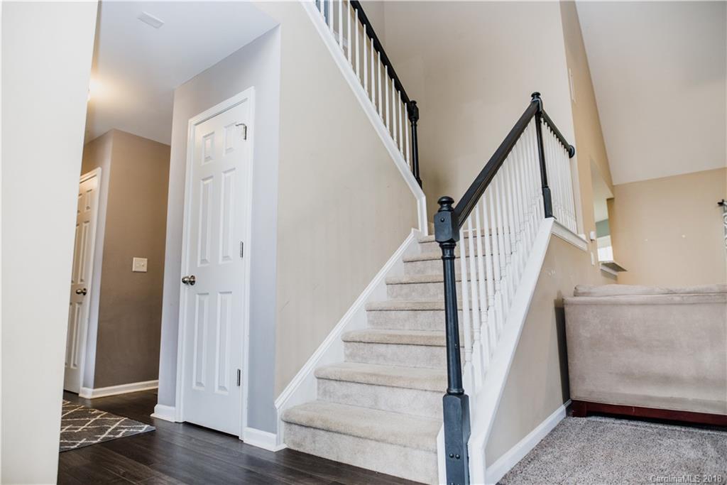 1735 Newland Road Denver, NC 28037 - Photo 3 of 24 a view of a hallway with wooden floor and entryway