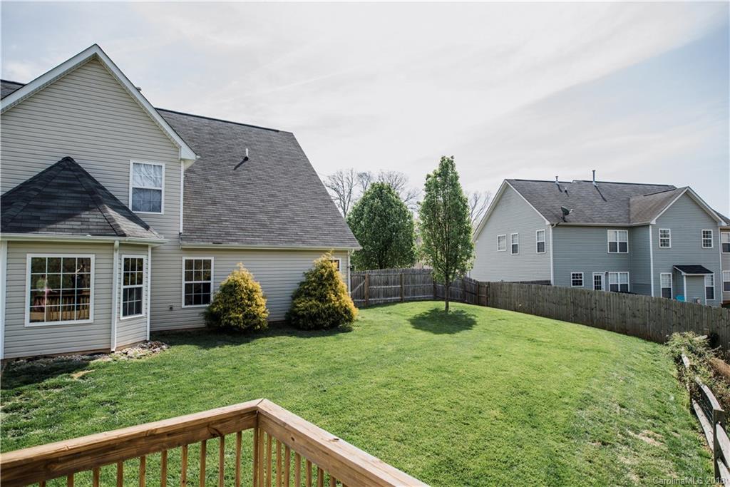 1735 Newland Road Denver, NC 28037 - Photo 21 of 24 a view of a house with a yard and plants