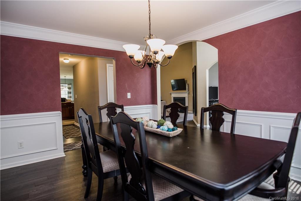 1735 Newland Road Denver, NC 28037 - Photo 10 of 24 a view of a dining room with furniture and wooden floor