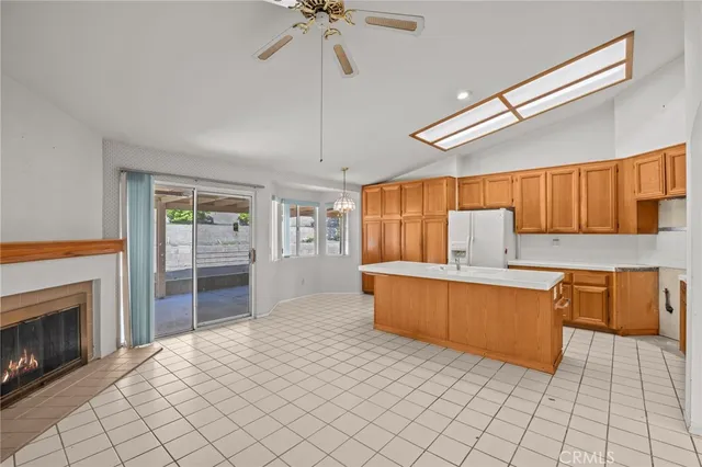 a view of empty room with fan and window