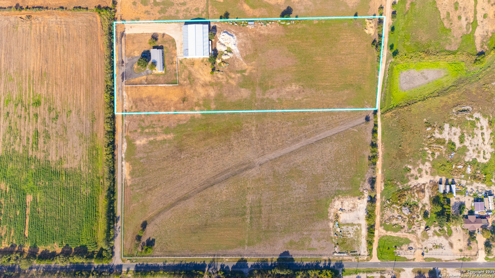11791 Kinney Road Atascosa, TX 78002 - Photo 1 of 28 a bathroom with a shower