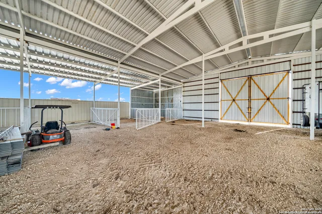 a view of a yard and a garage