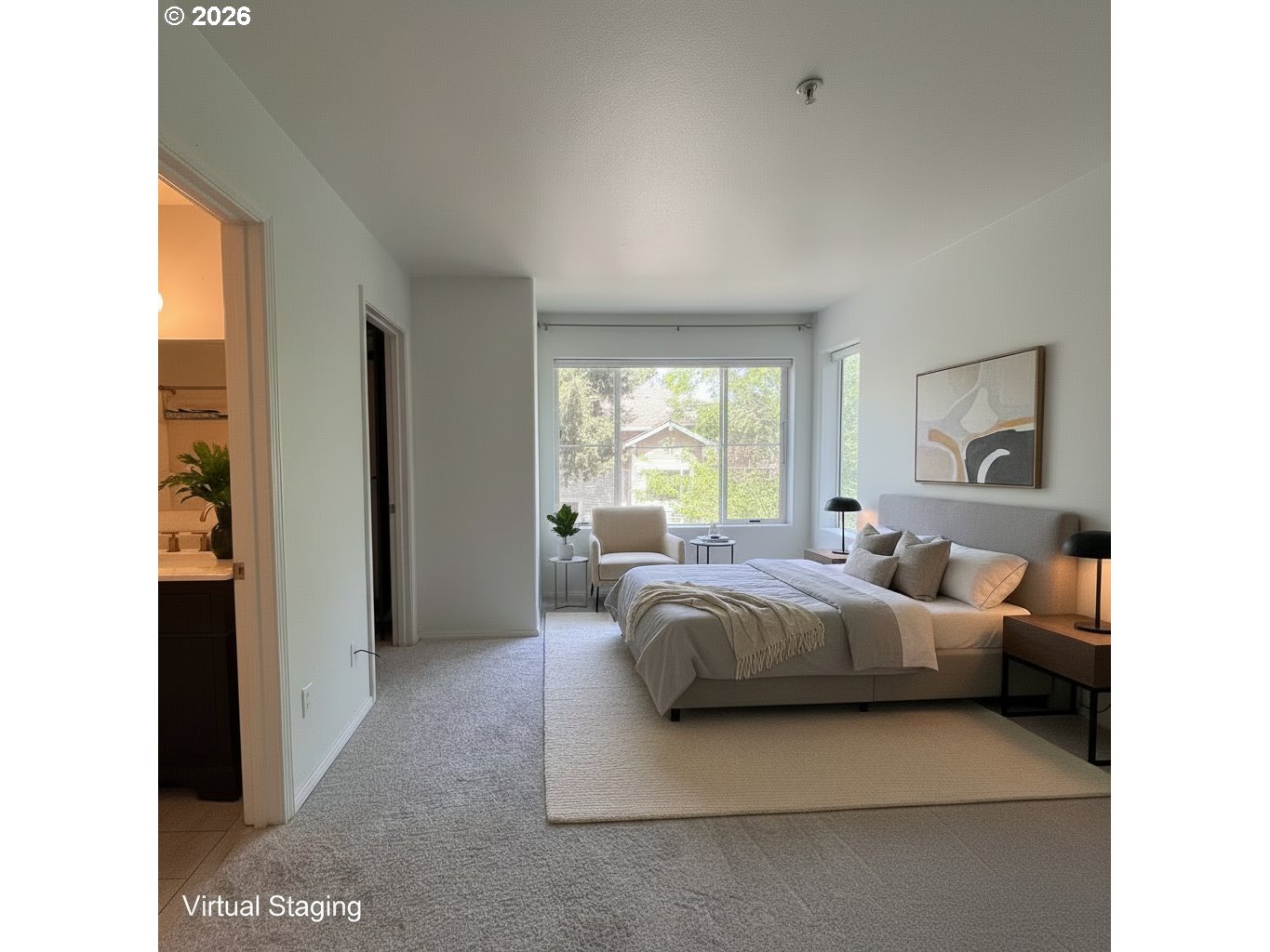14110 Southwest Barrows Road, Unit 1 Portland, OR 97223 - Photo 10 of 18 a living room with a bed furniture and a large window