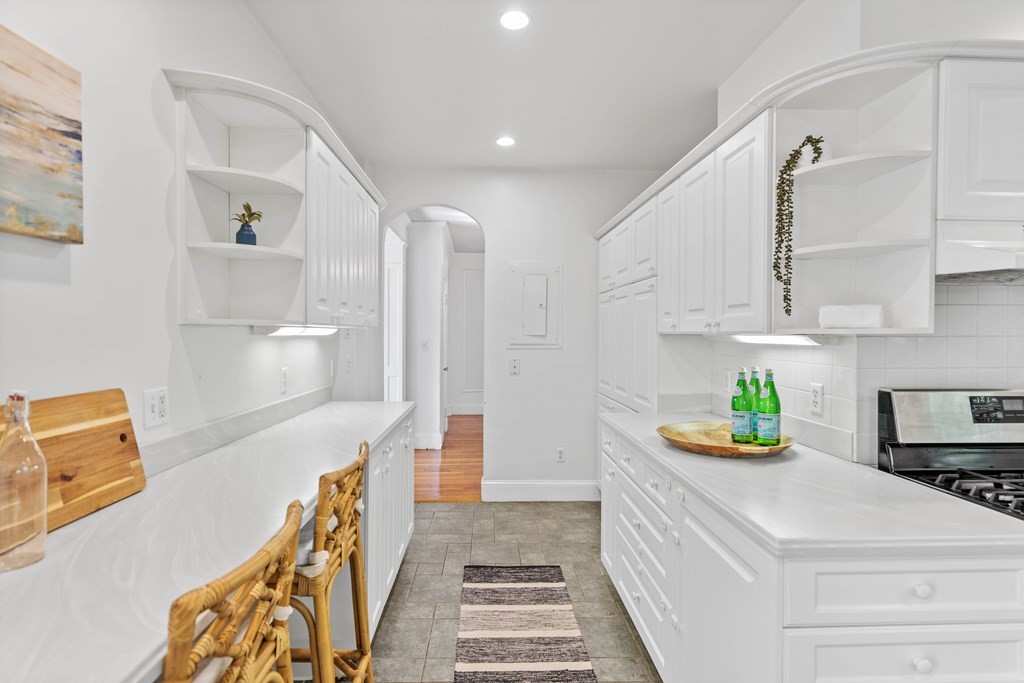 311 Tappan Street, Unit 2 Brookline, MA 02445 - Photo 16 of 26 a bathroom with a sink a mirror and shower