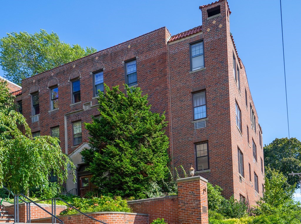 311 Tappan Street, Unit 2 Brookline, MA 02445 - Photo 24 of 26 a brick building with a large windows