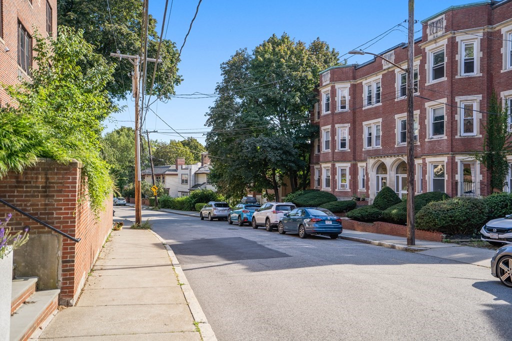 311 Tappan Street, Unit 2 Brookline, MA 02445 - Photo 26 of 26 a city street lined with buildings and cars