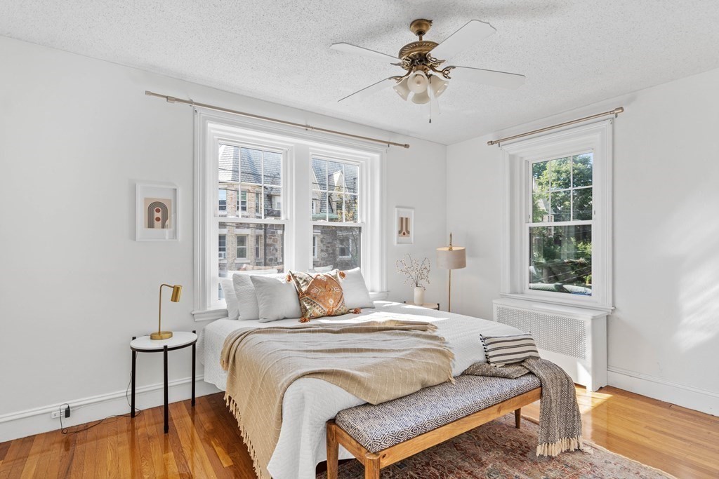 311 Tappan Street, Unit 2 Brookline, MA 02445 - Photo 5 of 26 a bedroom with a bed and a window