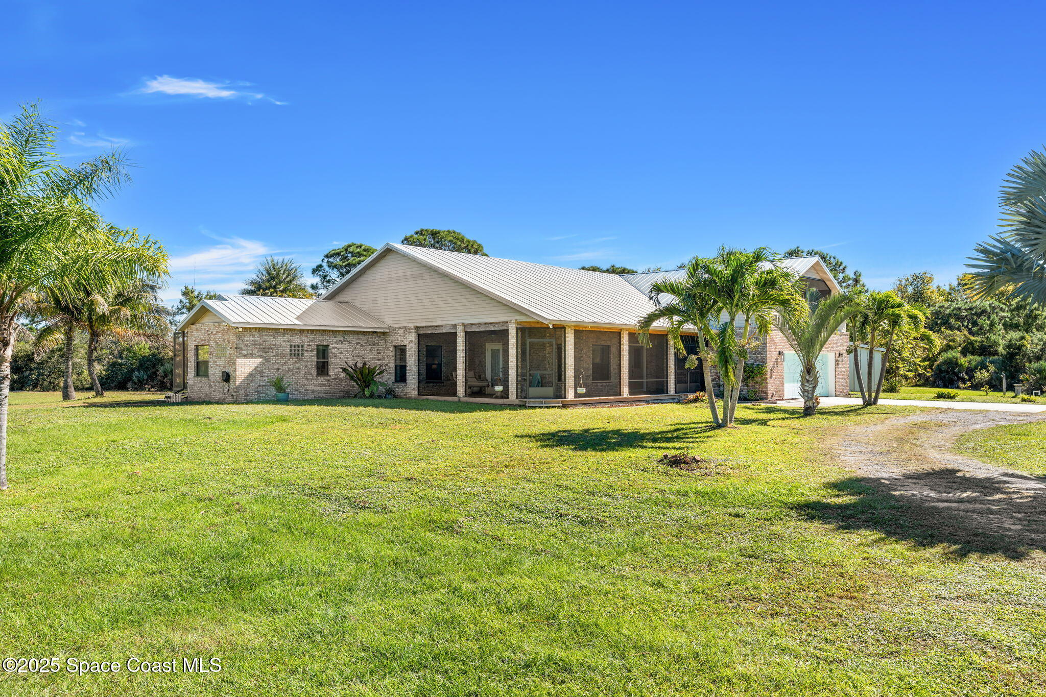 4540 Sand Point Road Grant Valkaria, FL 32949 - Photo 46 of 62 Side View of Home