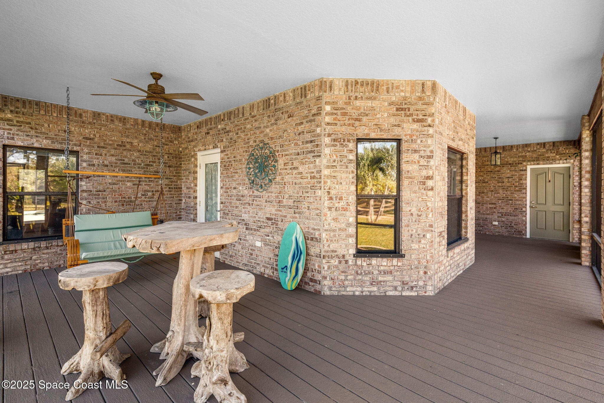 4540 Sand Point Road Grant Valkaria, FL 32949 - Photo 8 of 62 Wrap Around Screened Porch