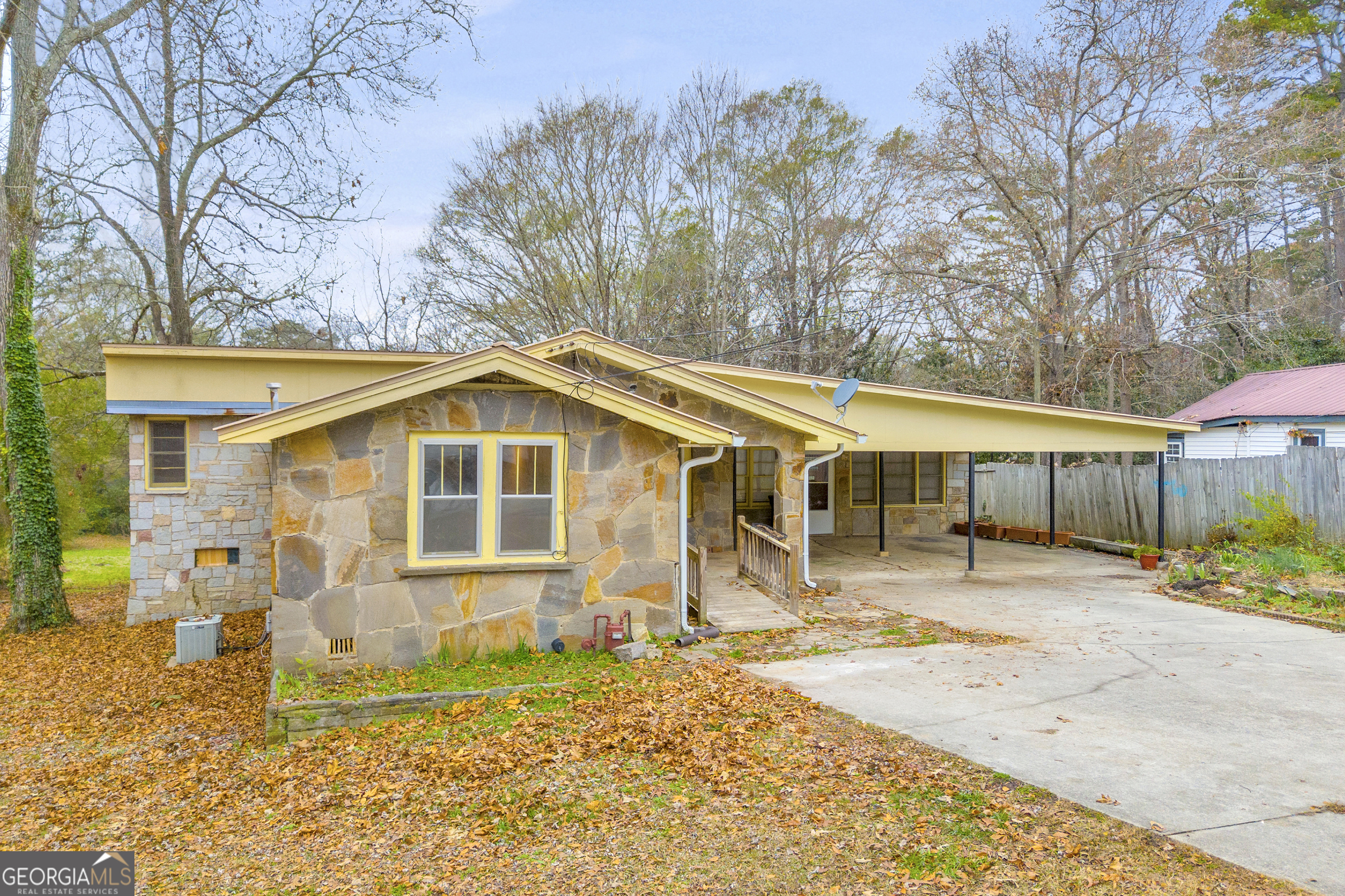 132 Queen Street Toccoa, GA 30577 - Photo 11 of 46 a view of a house with a yard covered in snow