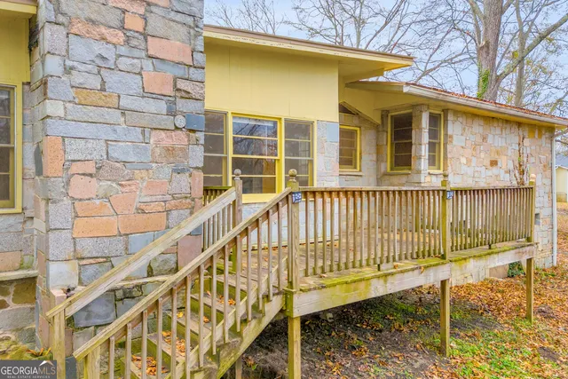 a view of a balcony with a potted plant