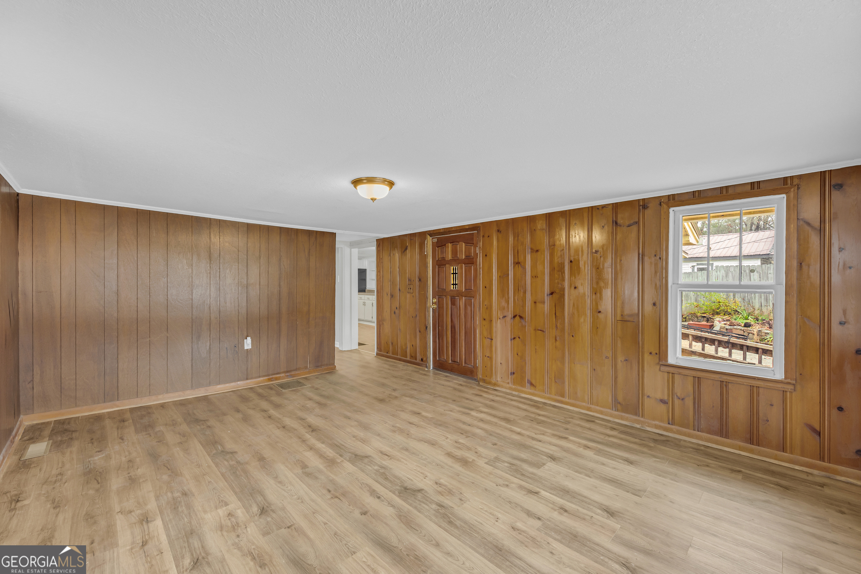 132 Queen Street Toccoa, GA 30577 - Photo 20 of 46 a view of an empty room with a window