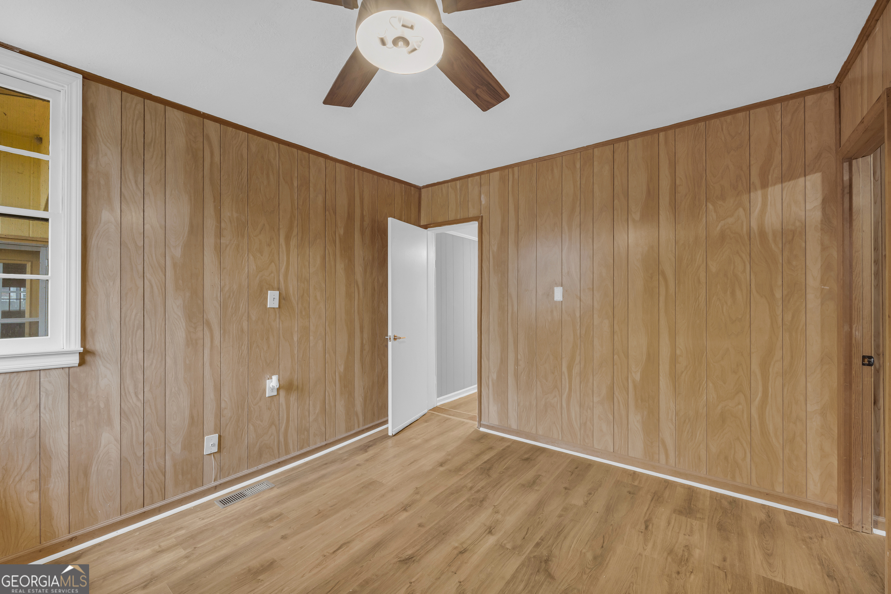 132 Queen Street Toccoa, GA 30577 - Photo 25 of 46 a view of an empty room with wooden floor