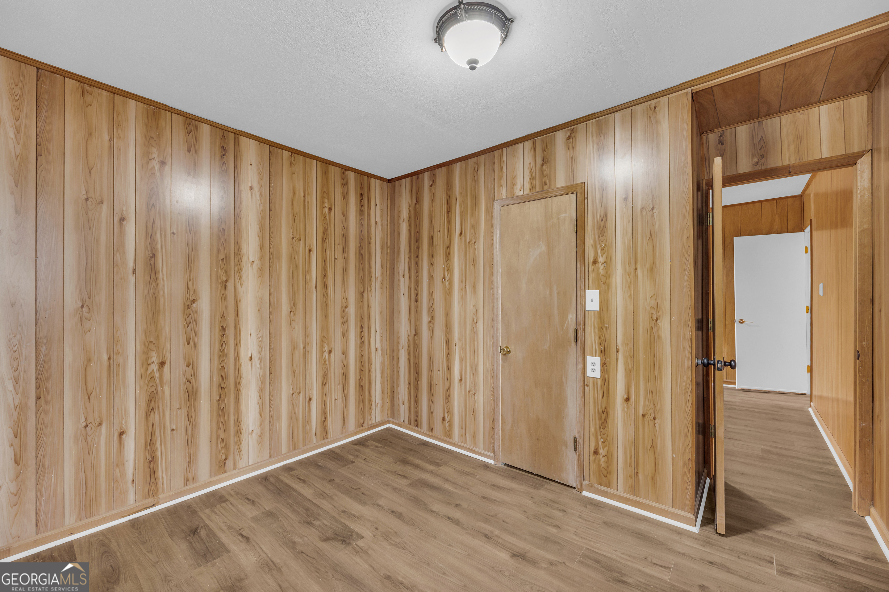132 Queen Street Toccoa, GA 30577 - Photo 30 of 46 a view of a hallway with wooden floor
