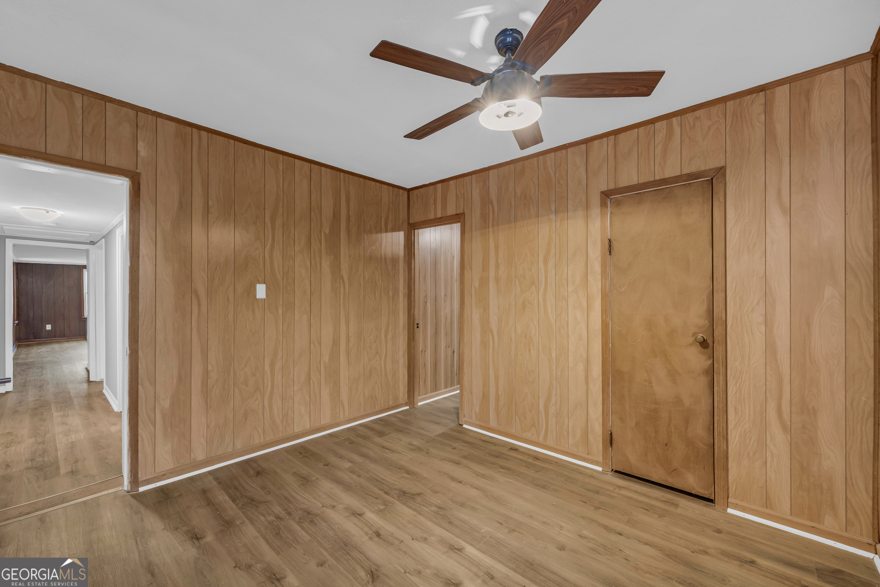 132 Queen Street Toccoa, GA 30577 - Photo 3 of 46 a view of an empty room with wooden floor