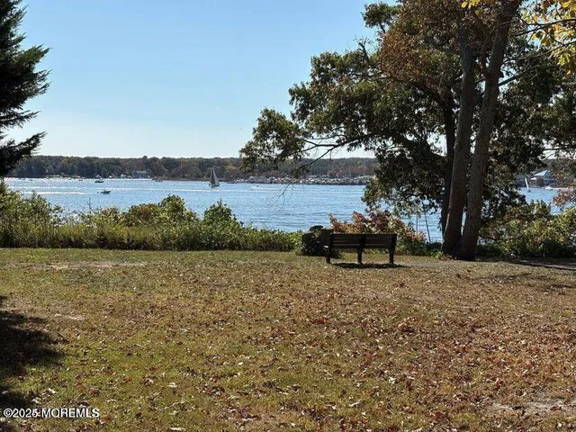 a view of a beach with a ocean